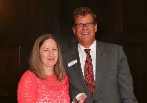 John Hallberg delivering the Butterfly Award to JoAnn Schultz