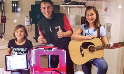 James Origo and friends playing the guitar