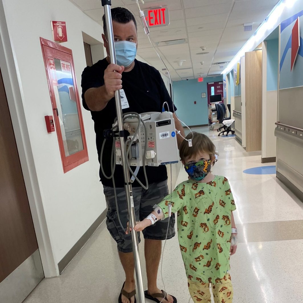 Kayden with his dad in the hospital