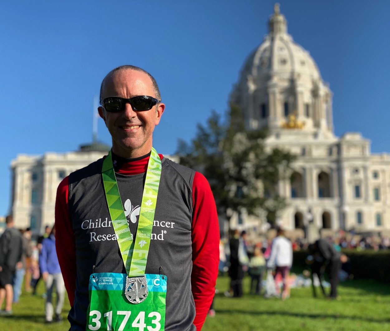 A marathon runner fundraising for Children's Cancer Research Fund